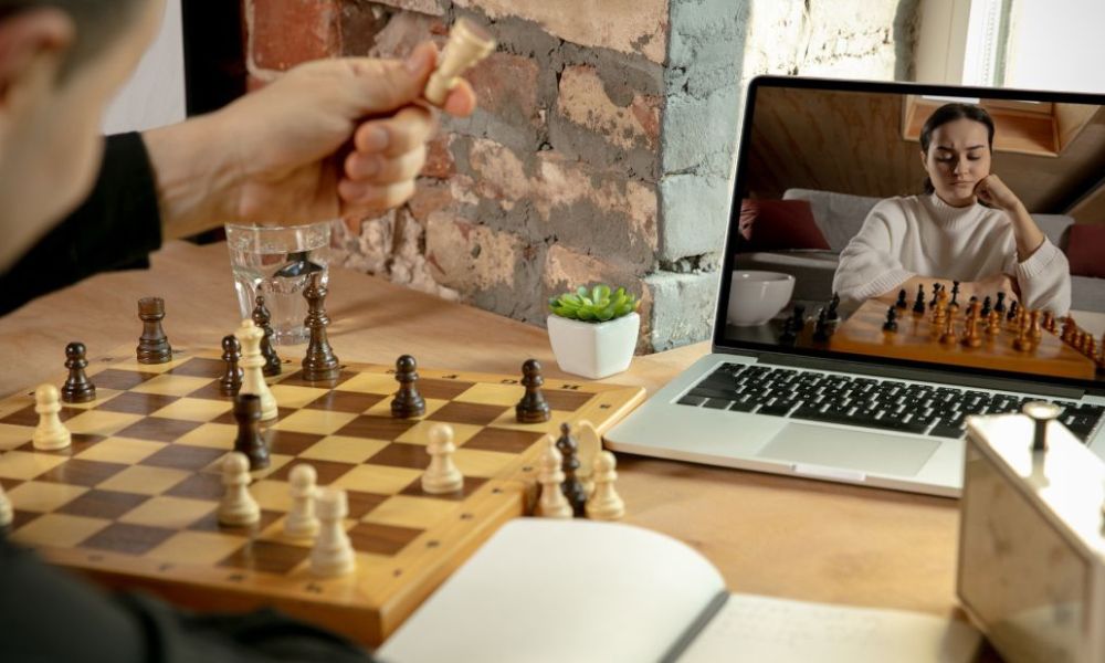 Learning and practicing a chess game through an online platform.