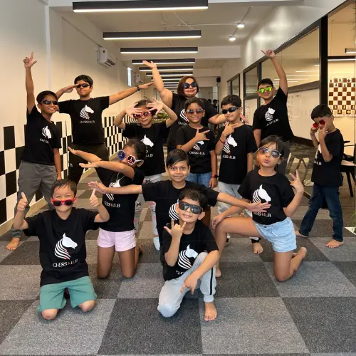 Students celebrating at CHESS KLUB center